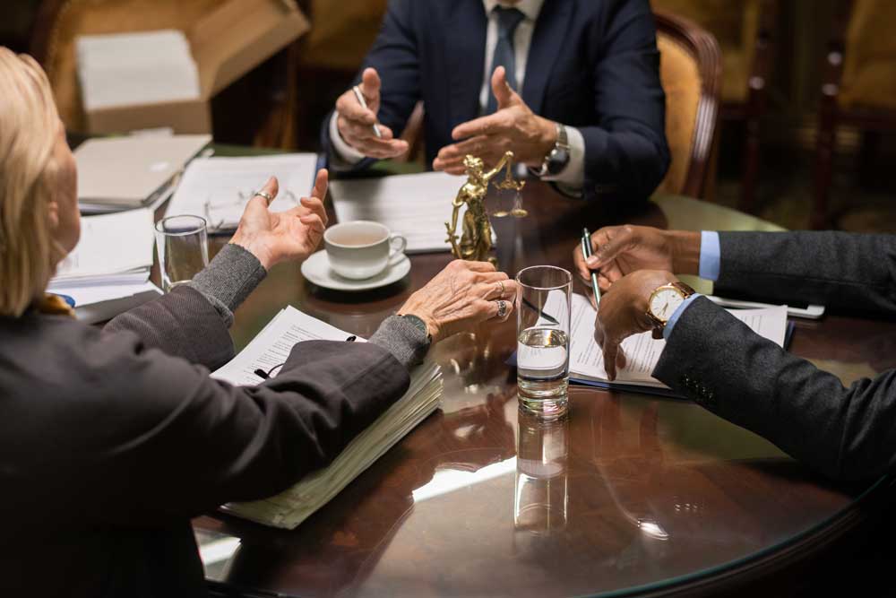 Hands Of Three Contemporary Lawyers During Discuss 2021 11 04 21 48 04 Utc